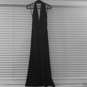 Floor length black gown deep V and low back